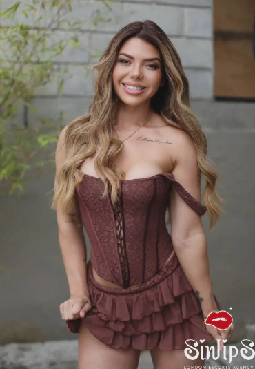 Danone, busty Brazilian escort in London (Oxford Circus) wearing a mini skirt